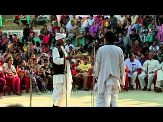 Famous Manipuri comedians enact a street play on 2014 election