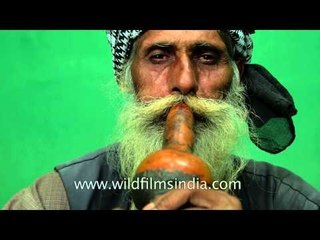 Indian Snake charmer in green screen