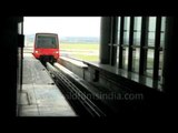Kuala Lumpur Airport Monorail Express arrives at its station