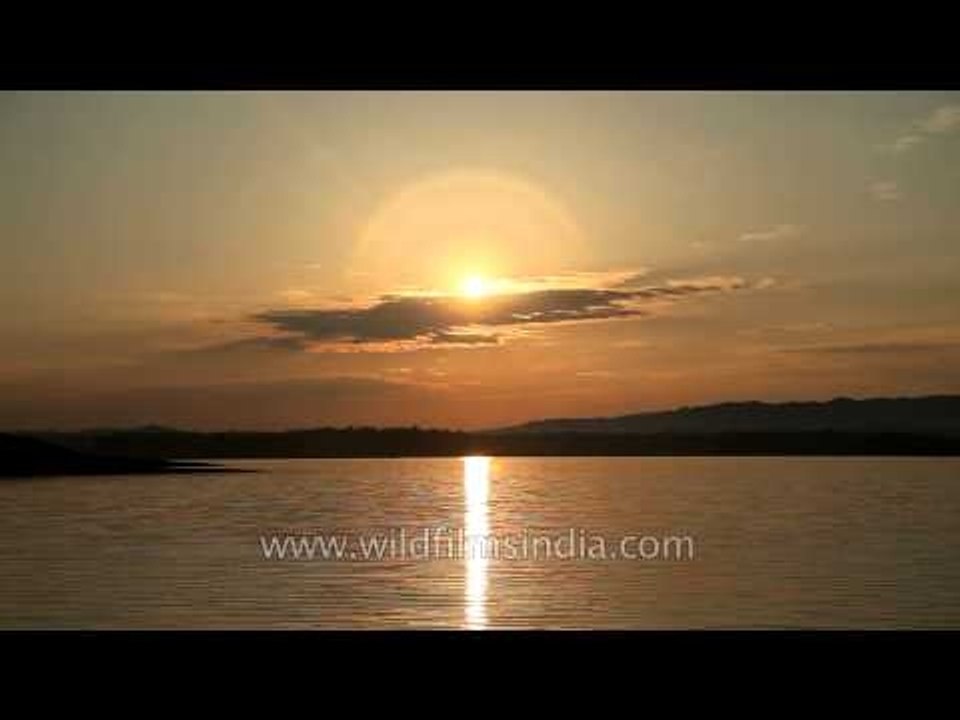 Rising sun reflection in the Denwa River at Satpura