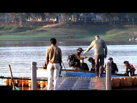 Visitors on boat to Satpura National Park, Madhya Pradesh