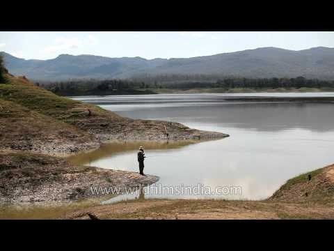 Man fishing on Denwa river in Satpura, Madhya Pradesh