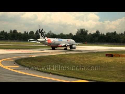 Low-cost Australian Airline: Jetstar Valuair taxiing on tarmac