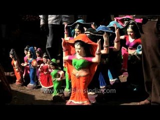 Clay dolls dressed in colourful saris
