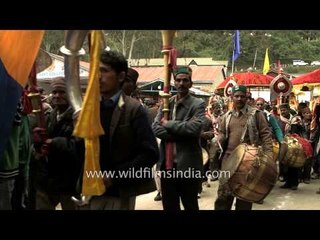 Devotees march during the traditional Jaleb