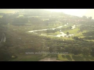 Flying over Singapore Strait and landing at Changi