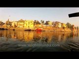 Coasting down Varanasi ghat in glow of evening light