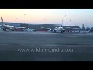 Planes stand at parking bays : Suvarnabhumi Airport, Bangkok