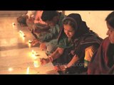 Devotees lighting 'diyas' on the auspicious occasion of Maha Shivratri