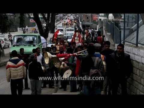 Devotees take part in a Mahashivratri procession in Mandi