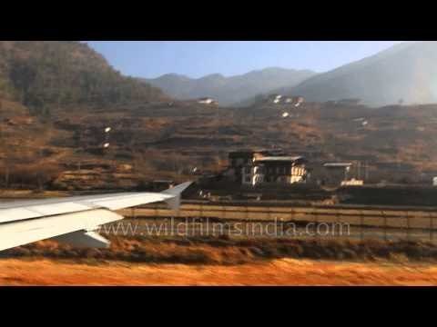 Rapid take-off from Paro airport runway in Bhutan