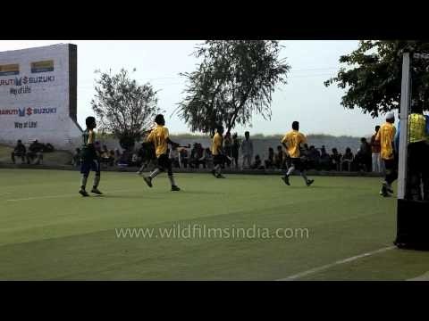 Hockey players in action at Kila Raipur Rural Olympic