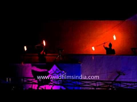 Fire jugglers light trails during Sangai Festival