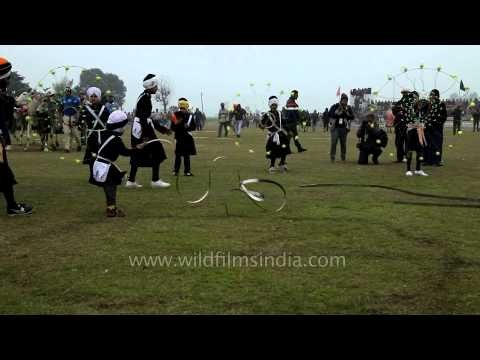Young boys from Nihang sect demonstrating martial arts