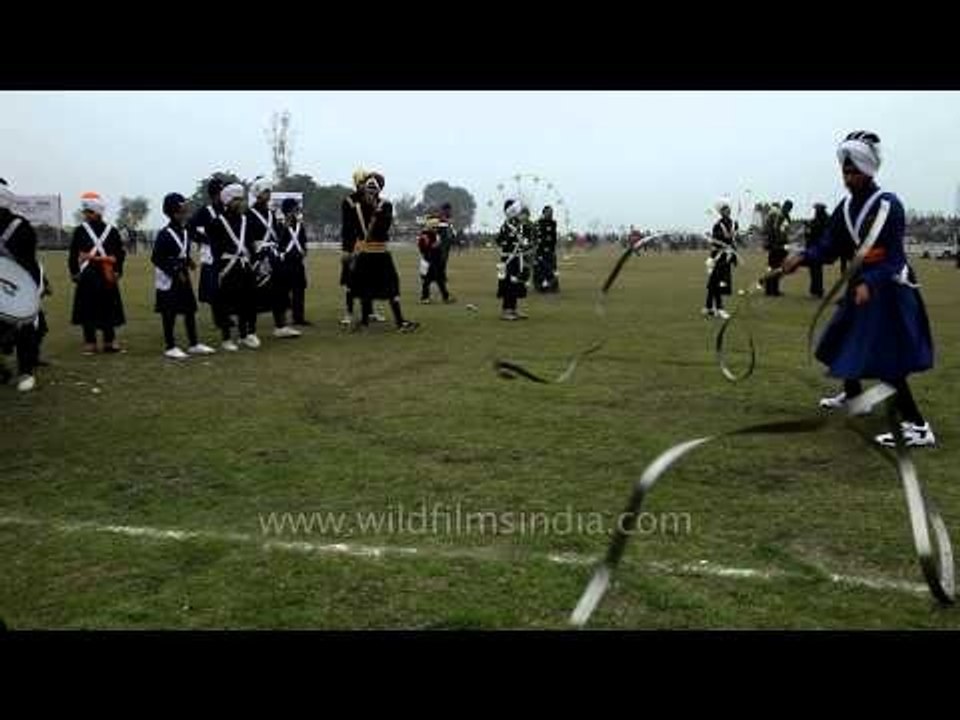 Nihangs exhibiting the skills of martial arts: Kila Raipur