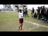 Young boy lifts a heavy barbell at Rural Olympics in Punjab