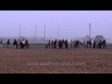 Indian villagers compete in a horse cart race: Kila Raipur