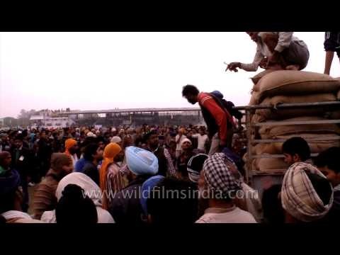 Eagerly waiting for the sack carrying competition