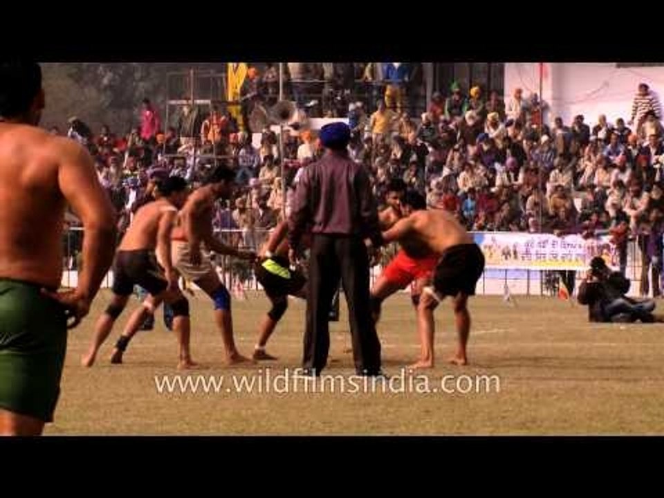 Kabaddi players in action during the match