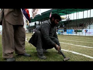 Flags lined on the ground during Rural Olympics