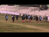 Players warm up during a practice session at Kila Raipur Sports Festival