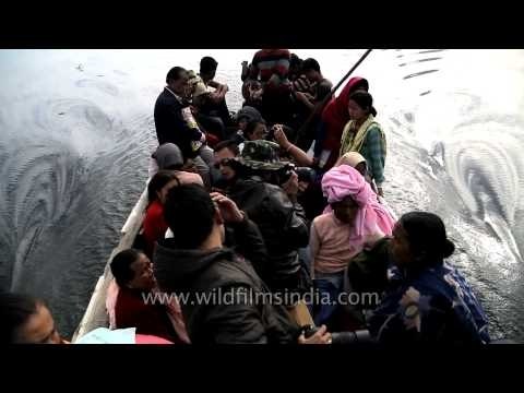 People travelling by steam boat on Loktak Lake