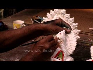 Artist paints goddess Saraswati at Kumortuli workshop