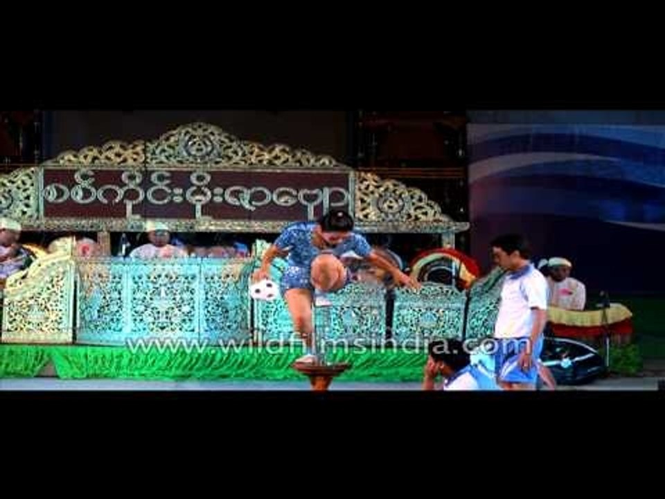Juggling while balancing on a bottle - at Sangai festival