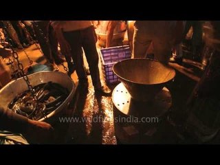 Fish being weighed for market sale in West Bengal