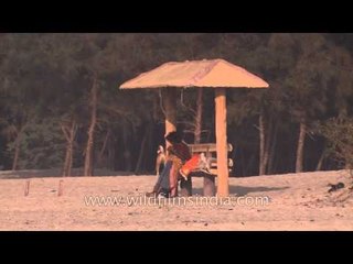 Old woman relaxing at Bakkhali beach