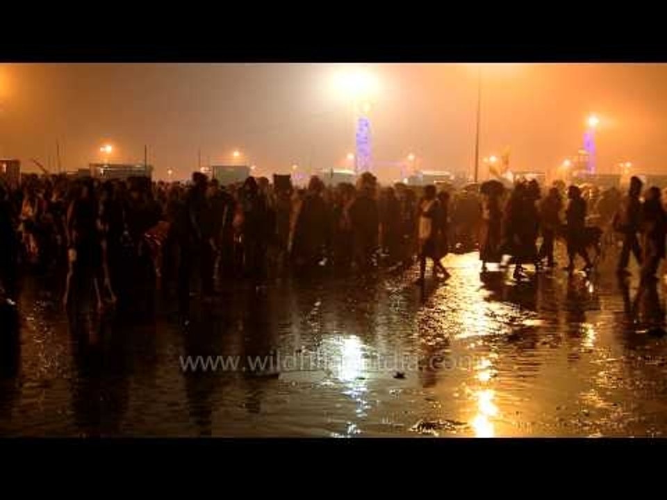Devotees returning after the holy dip