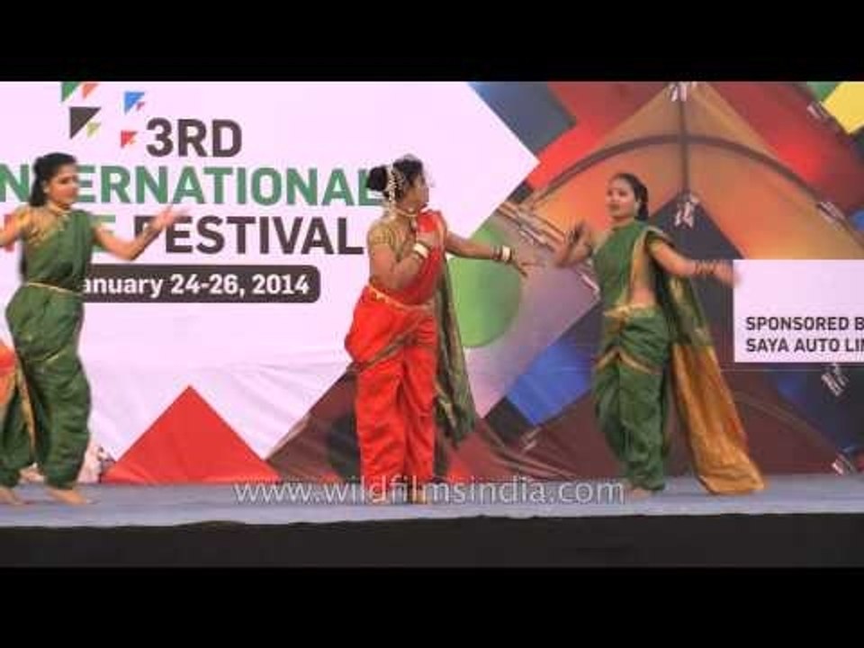 Lavani dancers dancing to the beats of Dholki