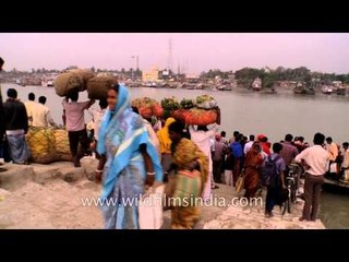 Boat loaded with people at Hotania-Doyania river, West Bengal