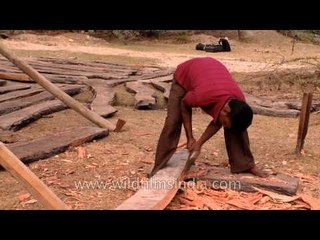 Carving with an axe a boat making process