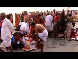 Dressing up after the holy bath: Gangasagar mela