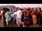 Thousands of devotees thronged on the banks of holy river