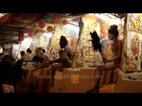 Hindu saints smeared with ash on face performs ritual