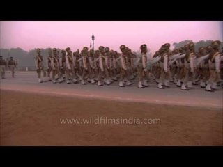 Soldiers rehearse on a cold, foggy morning for Republic Day