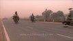 Soldiers practising the bike stunt on a cold morning for Republic Day