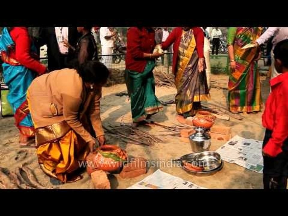 Tamil ladies busy making pongal on Kaannum Pongal