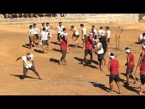 Top spinning an indigenous game demonstrated by the Kuki folks
