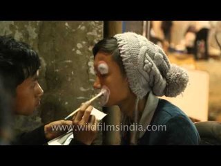 Step by step face painting at Night bazaar, Kohima