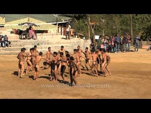 Demonstrating an indigenous game by Sumi youth at Naga Heritage