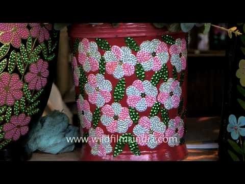 Hues and sizes of beautiful hand painted vases
