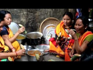 Spirit of festival enchanced by country beer and Kachari delicacies