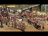 Naga tribals marching towards the main arena at Hornbill Fest