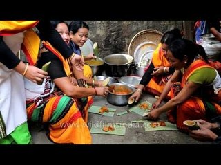 Drinking from a bamboo container adds an exotic taste to rice beer