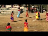 Mech Kachari cultural troupe displaying their indigenous game