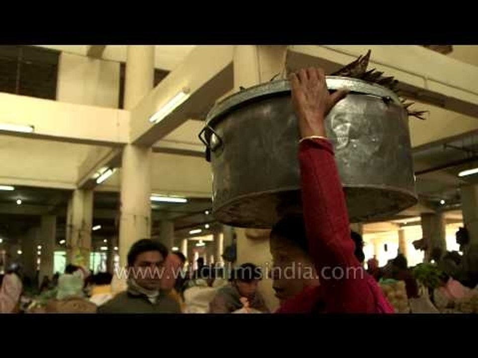Women selling dried smoked fish at Khwairamband Bazar in Imphal