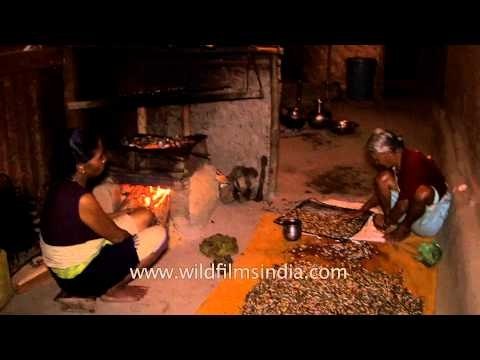 Manipuri women preparing the smoked fish